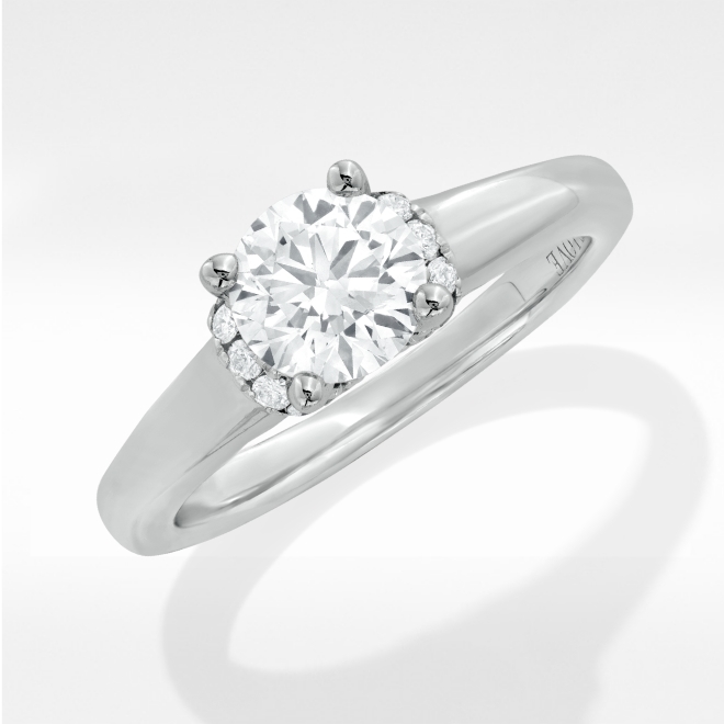 White Gold - Sleek and modern, white gold pairs beautifully with diamonds for a sophisticated look. 