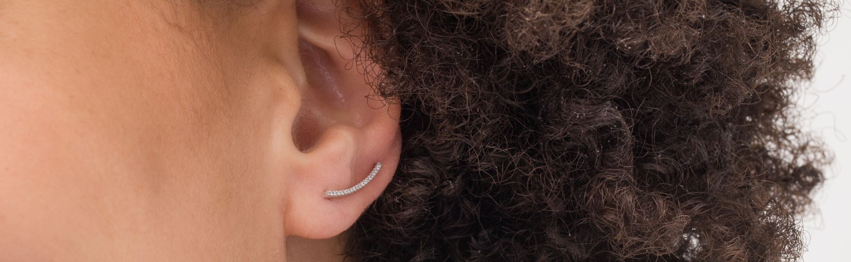 Crawlers - Also known as ear climbers, a crawler style can give the illusion of multiple piercings.