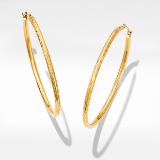 Gold Hoops - Simple and classic, you can never go wrong with gold hoops. 