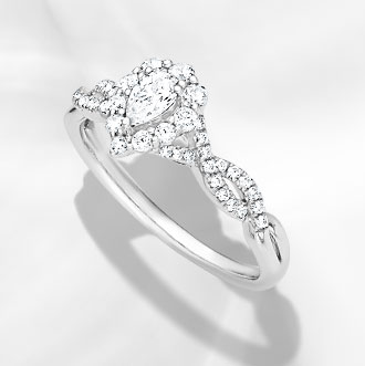 Halo  - Make a statement with a halo ring, a center diamond surrounded by smaller diamonds.
