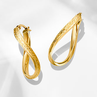 10-18K Yellow Gold Earrings - Add a timeless touch to your look with classic 10-18K gold earrings.
