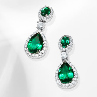 Gemstone Earrings - Brighten your ensemble with gemstone earrings that burst with vibrant colors.