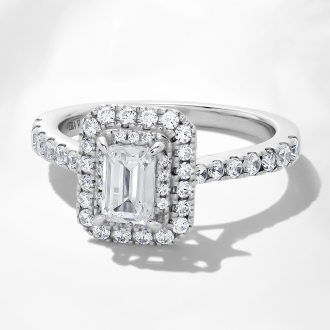 Halo  - Make a statement with a halo ring, a center diamond surrounded by smaller diamonds.