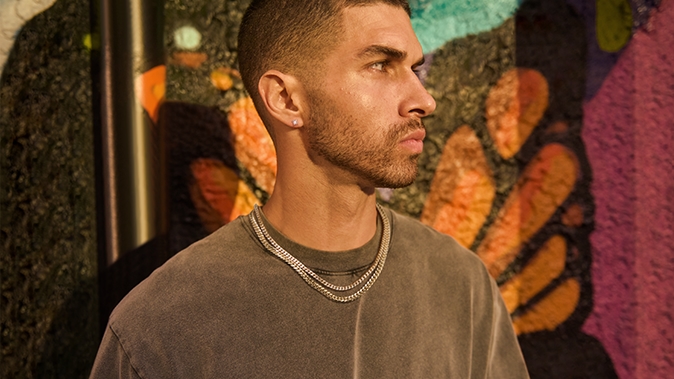 Man wearing bold and modern men's jewelry from KAY