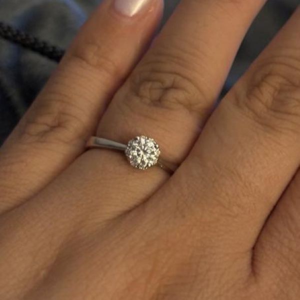 "Nice simple engagement ring. Diamond is real and very sparkly."