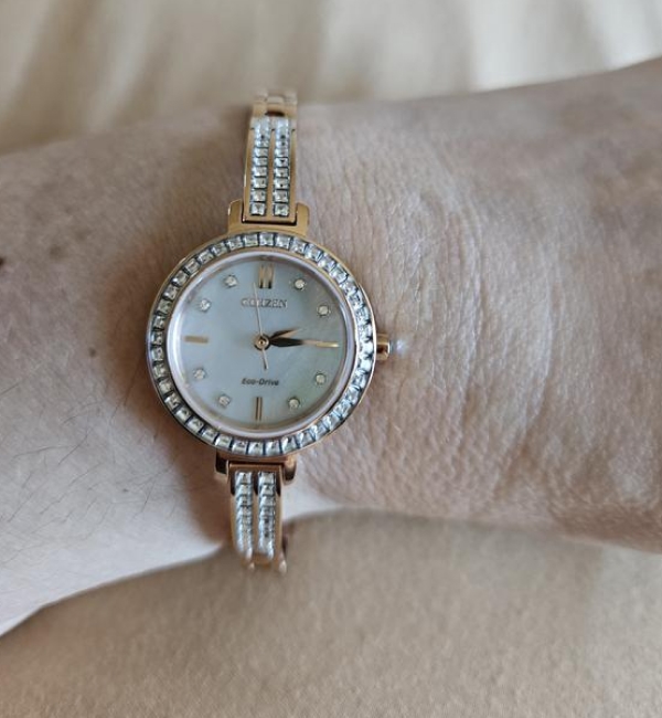 "I love this new watch so much. I hoped it would be more of a bangle, and it definitely is! The rose gold is gorgeous and the mother of pearl dial just finishes it all off with the gem stones."