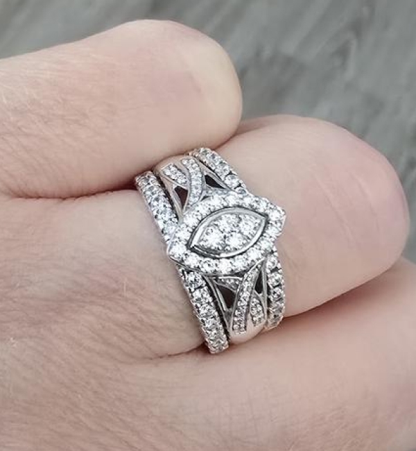 "Fabulous promise, engagement or travel ring option. Sparkles like crazy. Sturdy construction. Substancial optics and look of size."		
